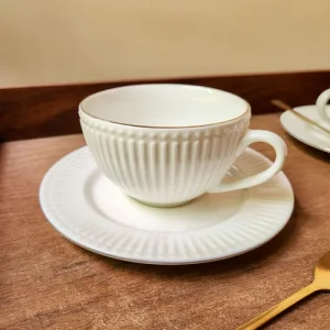 TAZA Y PLATO DE TE ACAPULCO BORDE DORADO 200 ML.